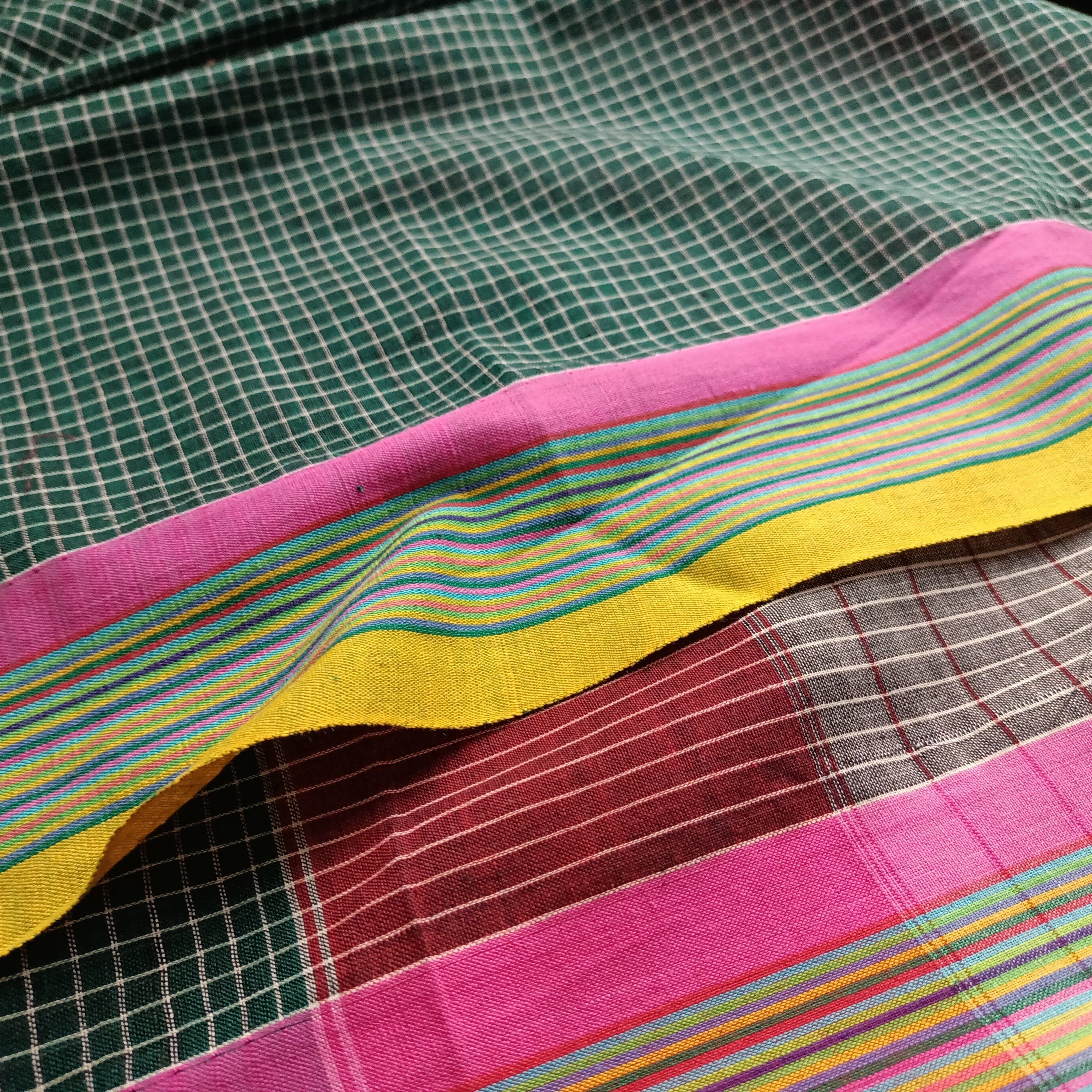 Small checks dark green cotton saree with yellow and pink border