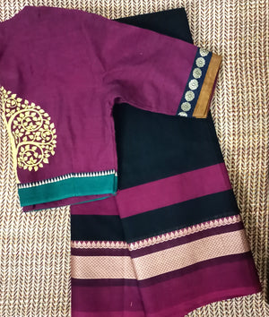 Magenta blouse with black saree combination 
