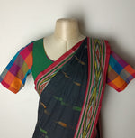 Umbara designs - Black chettinad saree with green cotton blouse 